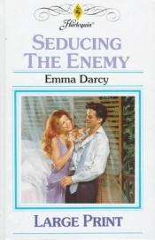 book cover of Seducing the Enemy by Emma Darcy