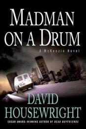 book cover of Madman on a drum by David Housewright