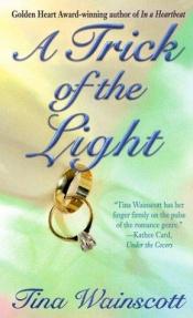 book cover of A Trick Of The Light by Tina Wainscott