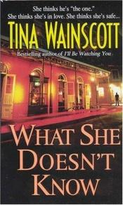 book cover of What She Doesn't Know by Tina Wainscott