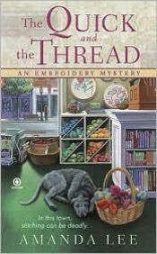 book cover of The Quick and the Thread [Embroidery Mystery Book 1] by Rebecca York