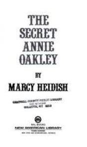 book cover of The Secret Annie Oakley by Marcy Heidish