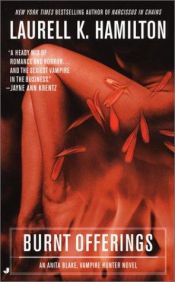 book cover of Égő áldozatok : Anita Blake, a vámpírvadász 7 by Laurell K. Hamilton