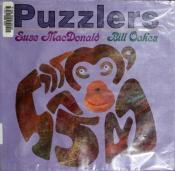 book cover of Puzzlers by Suse MacDonald
