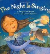 book cover of The night is singing by Jacqueline Davies