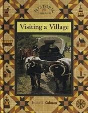 book cover of Visiting a Village by Bobbie Kalman