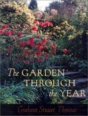 book cover of The garden through the year by Graham Stuart Thomas