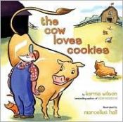 book cover of The cow loves cookies by Karma Wilson