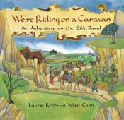 book cover of We're riding on a caravan by Laurie Krebs