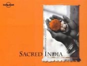 book cover of Sacred India by Lonely Planet